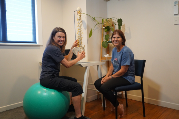 Jane speaking with a client in the clinic